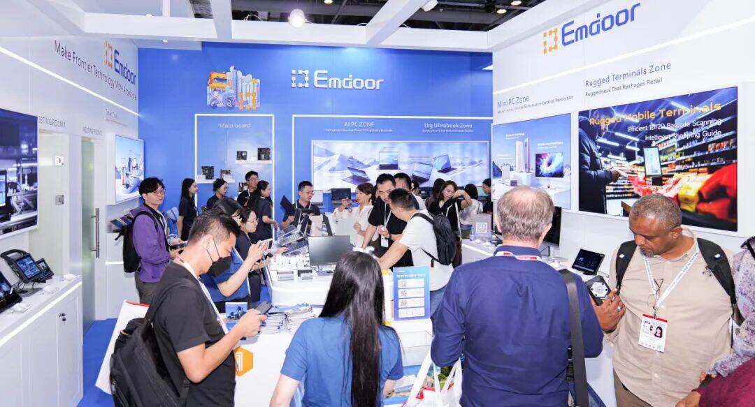 Visitors experiencing the EM-959 AI PC at Emdoor booth during Global Sources 2025.